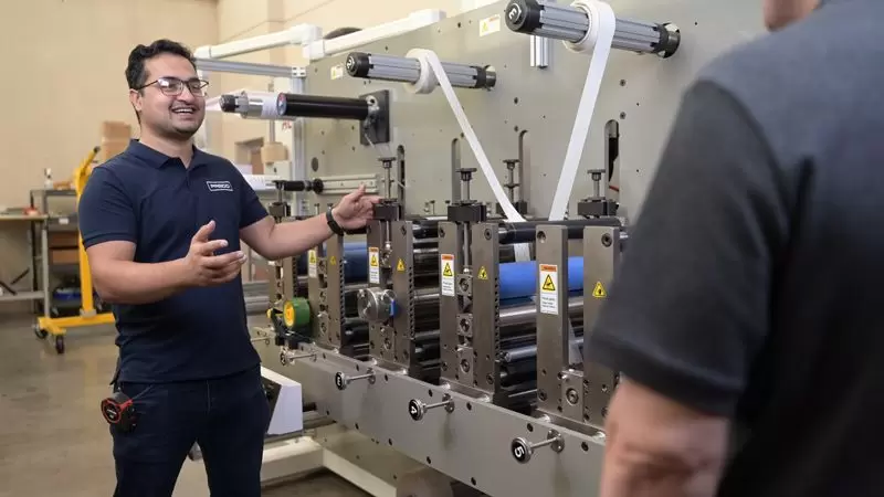 Preco associate working with customer