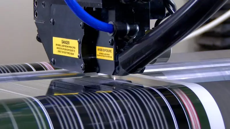 Laser perforating flexible packaging material