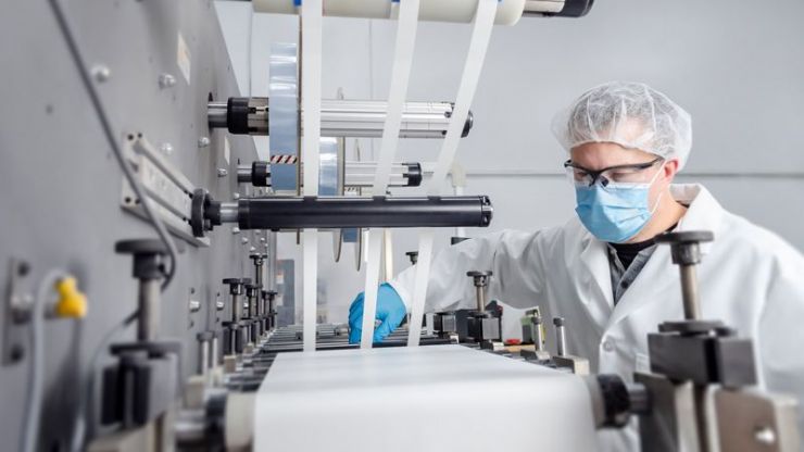 Contract manufacturing medical material on a rotary die cutting machine